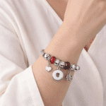 Twisted Cable Bangle Bracelet with Red Floral Charms - Image 2